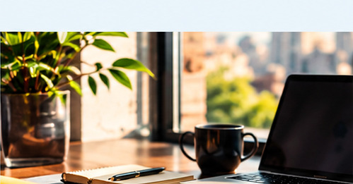 Business planning workspace with laptop and notebook